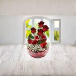 Arranged with 10 Red Roses and Baby Breath in a Fish Bowl Glass