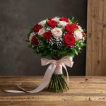 Arranged with 20 Roses White & Red, Baby Breath and Leaves Elegantly Arranged